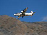 09 Airplane Coming In For Landing At Jomsom Airport 